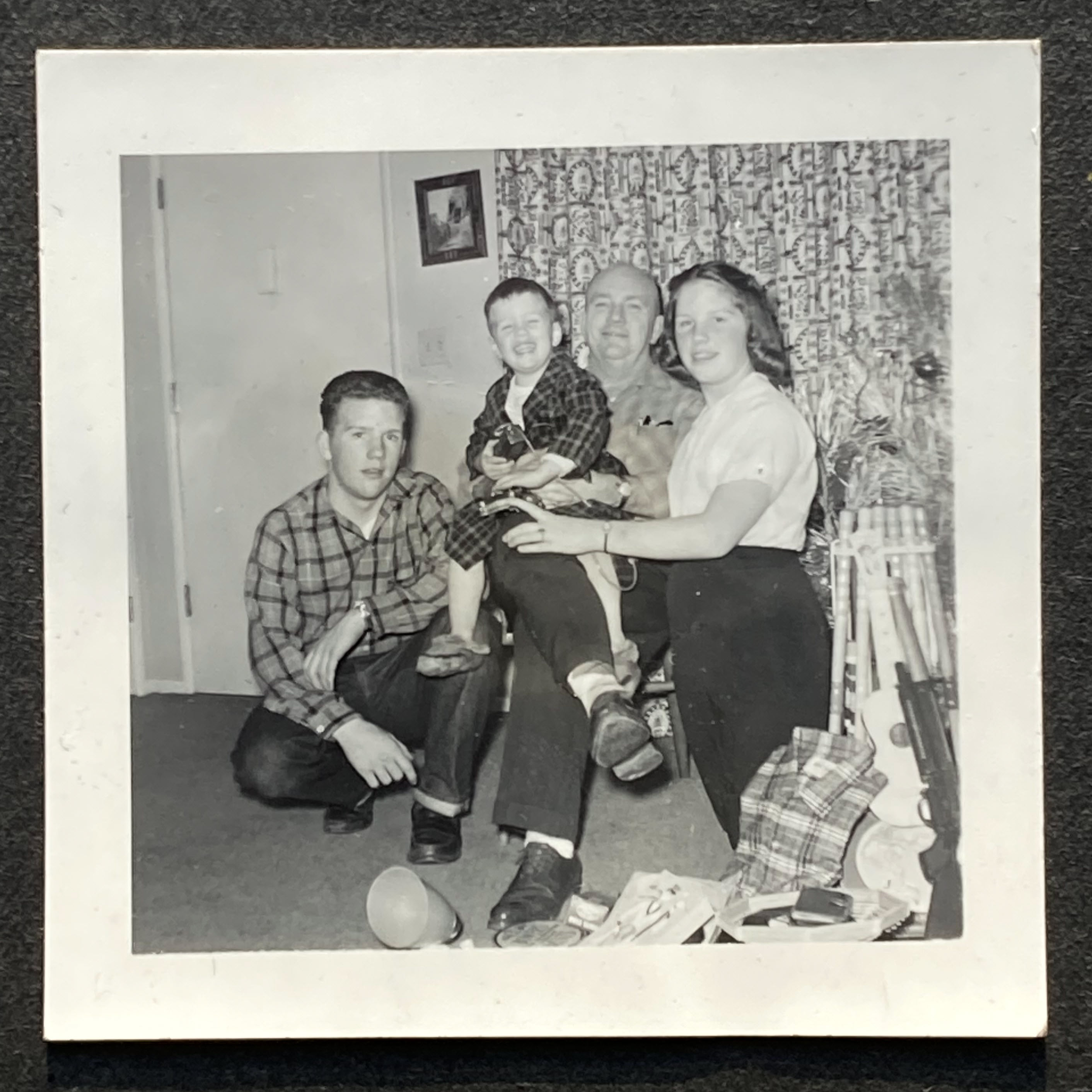 Bobby, Susan, and Mike on the porch of the new house.